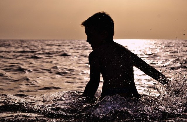 Make Sure Your Child Has Mastered Basic Swimming Strokes Before Paddle Boarding with Your Toddler